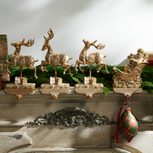 Load image into Gallery viewer, Gold Santa and Reindeer Stocking Holders