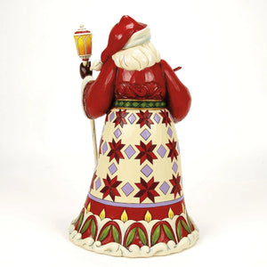 Spreading Christmas Cheer Santa holding Cardinal