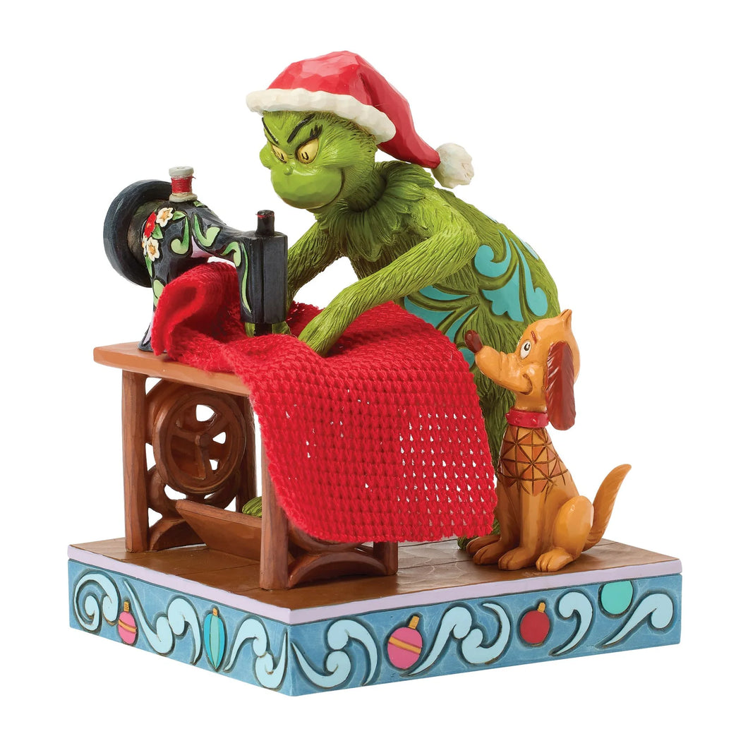 Grinch and Max Sewing a Santa Suit
