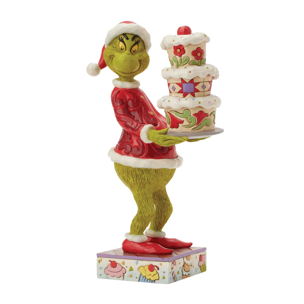 The Grinch with a Grinchy Cake